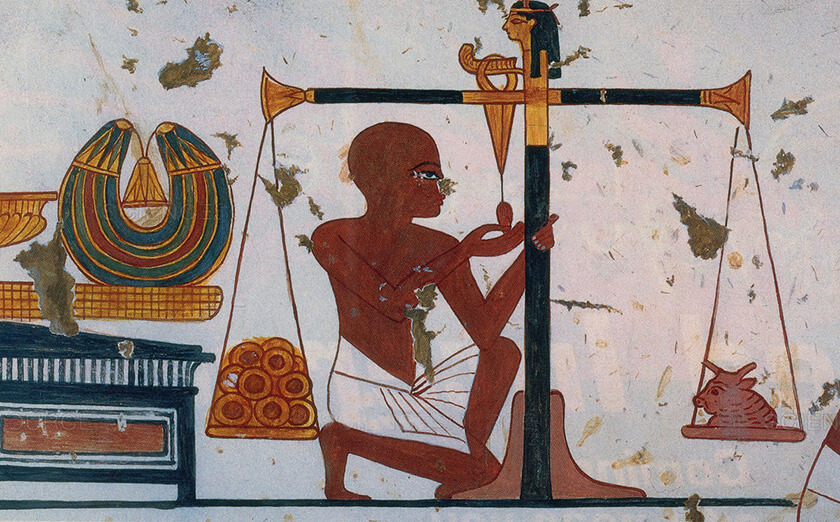 Pintura na parede de uma tumba egípcia do século XIV a.C. mostrando homem usando uma balança para pesar anéis de ouro, dados em pagamento equivalente a um boi